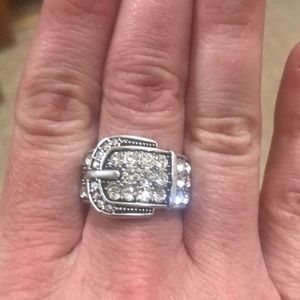 Premiere jewelry buckle ring.